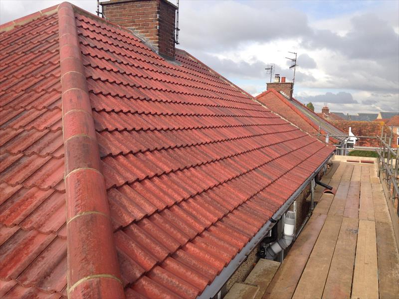 Tiled roof by Top Level Roofing & Building Solutions