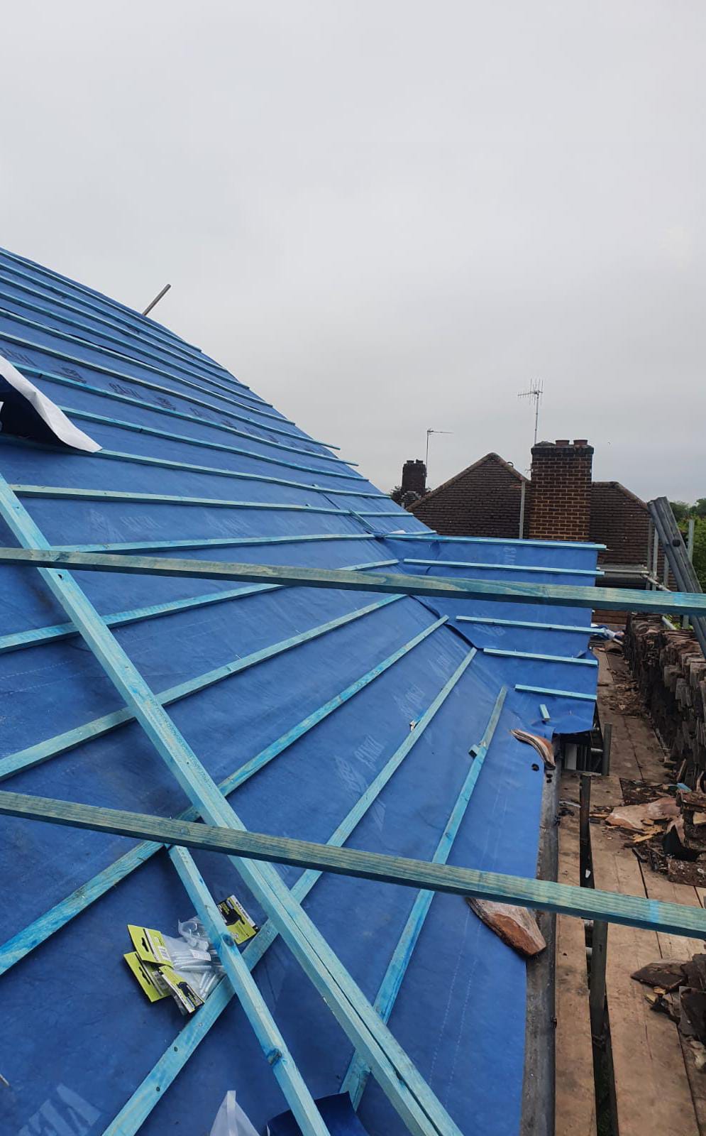 Roofing work in progress by Top Level Roofing & Building Solutions
