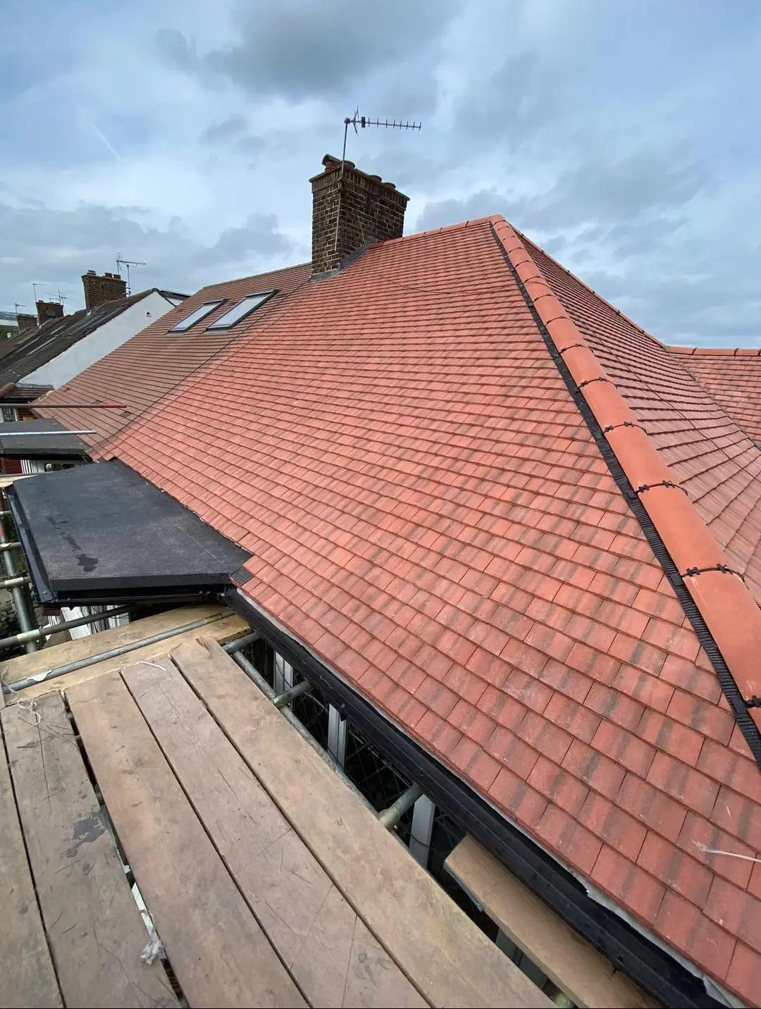 Tiled roof by Top Level Roofing & Building Solutions
