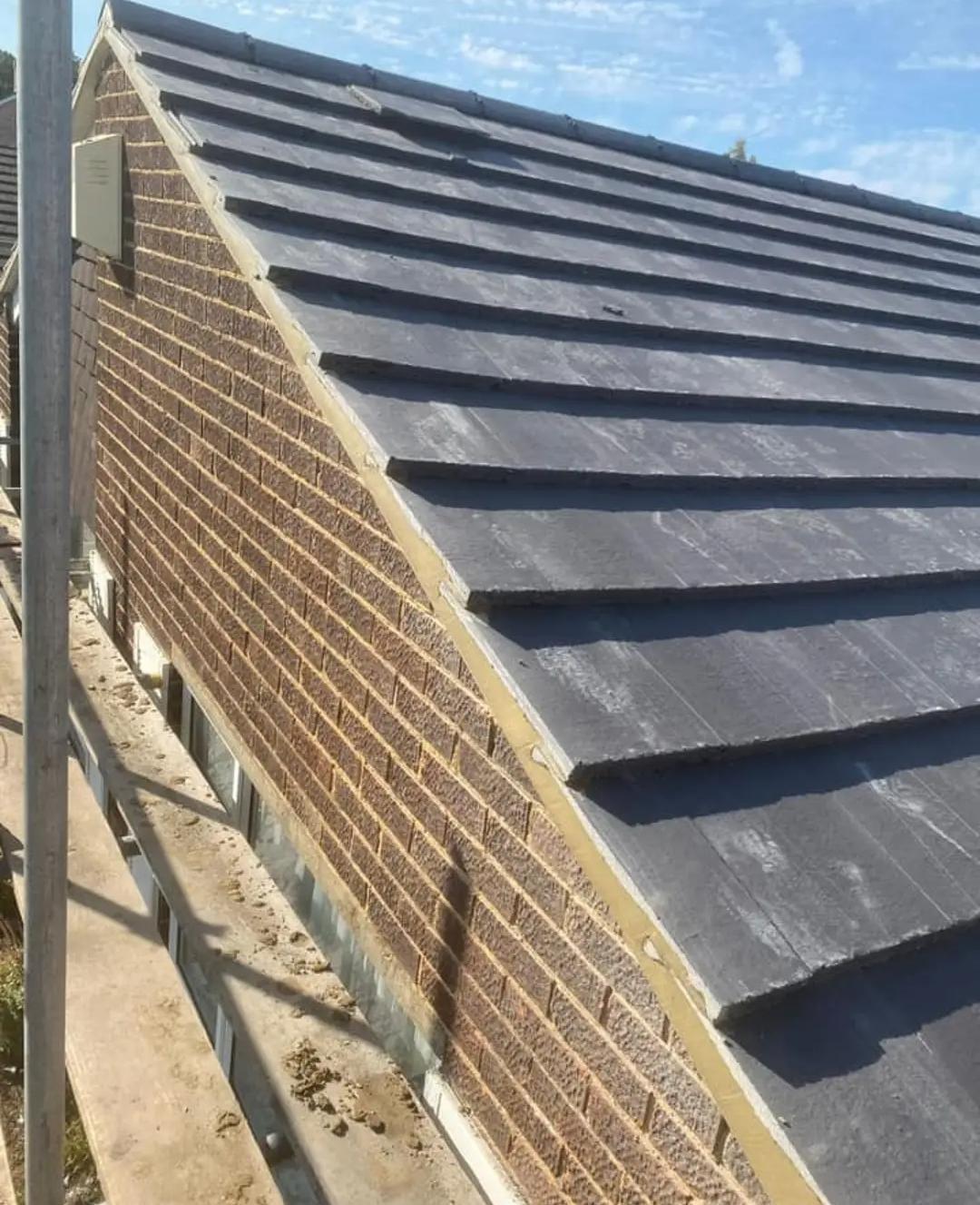 Slate roof by Top Level Roofing & Building Solutions