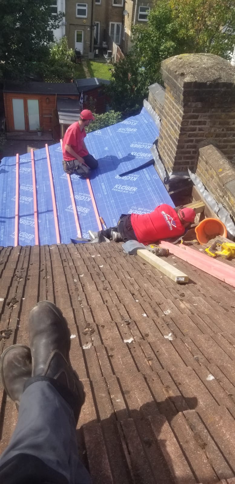 Roofing work in progress by Top Level Roofing & Building Solutions