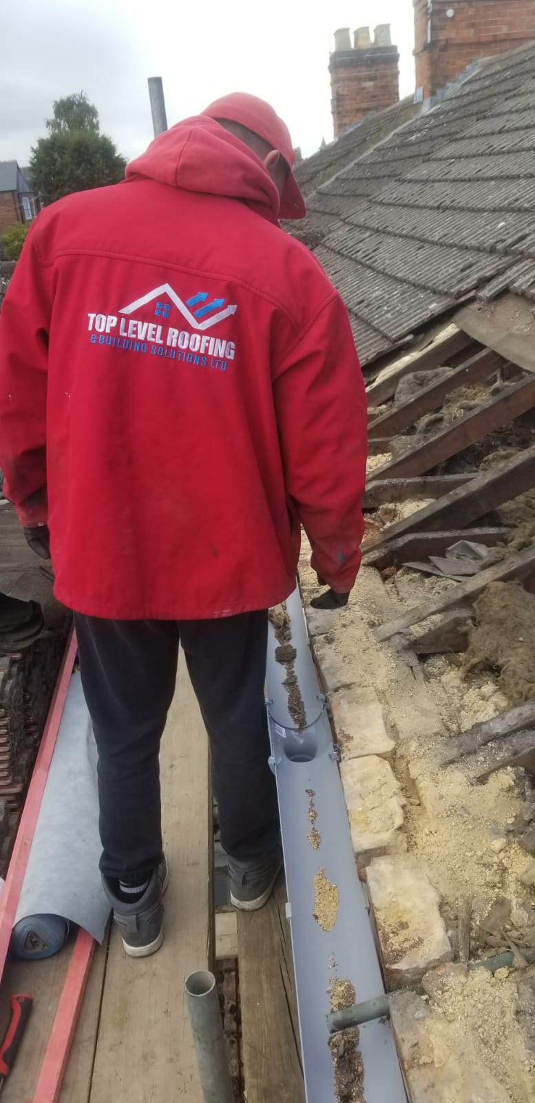 Roofing work in progress by Top Level Roofing & Building Solutions