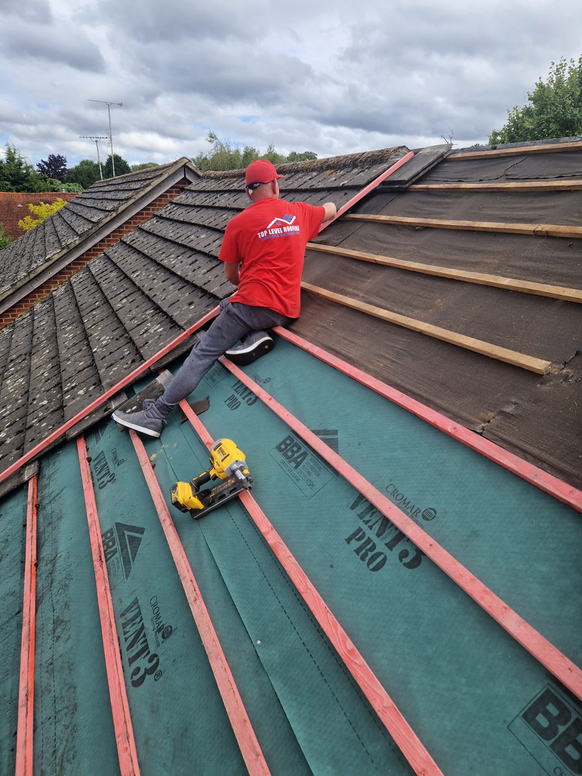 Re-roof in progress by Top Level Roofing & Building Solutions