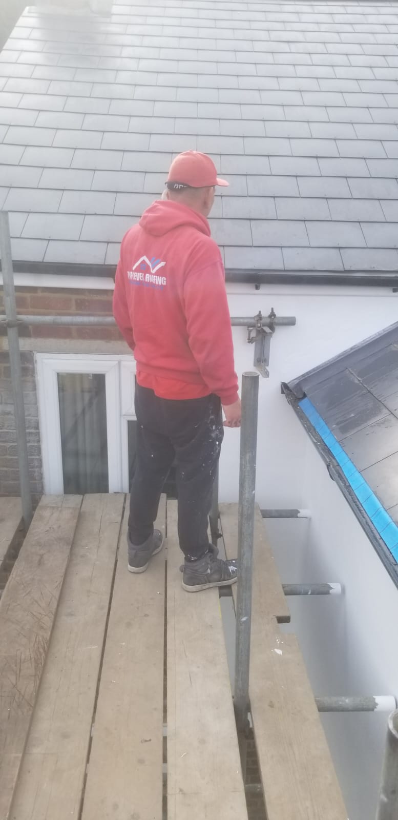 Slate roof by Top Level Roofing & Building Solutions