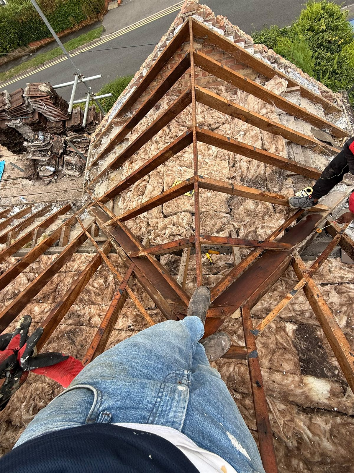 A roof stripped to the rafters ready to re-roof by Top Level Roofing & Building Solutions