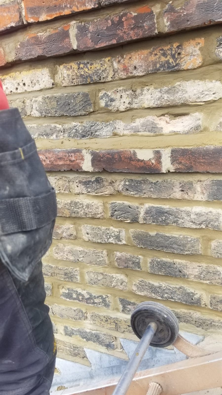 Freshly repointed chimney brickwork by Top Level Roofing & Building Solutions