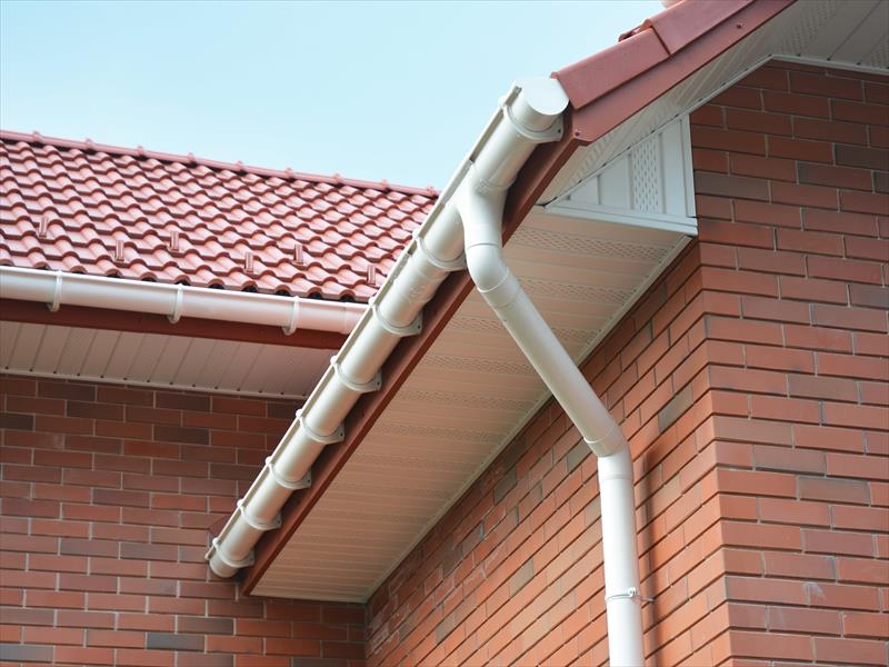 New guttering and downpipe fitted to a house